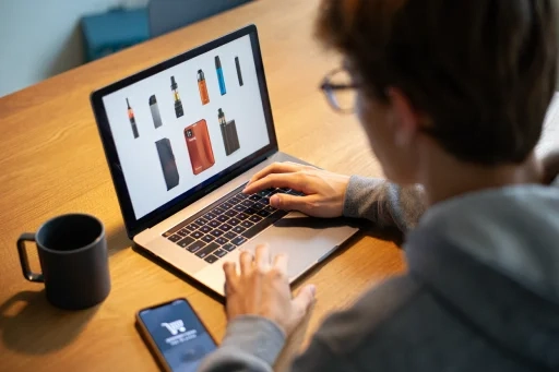 Image showing a person browsing online vape products, representing online places where to buy vapes near me.